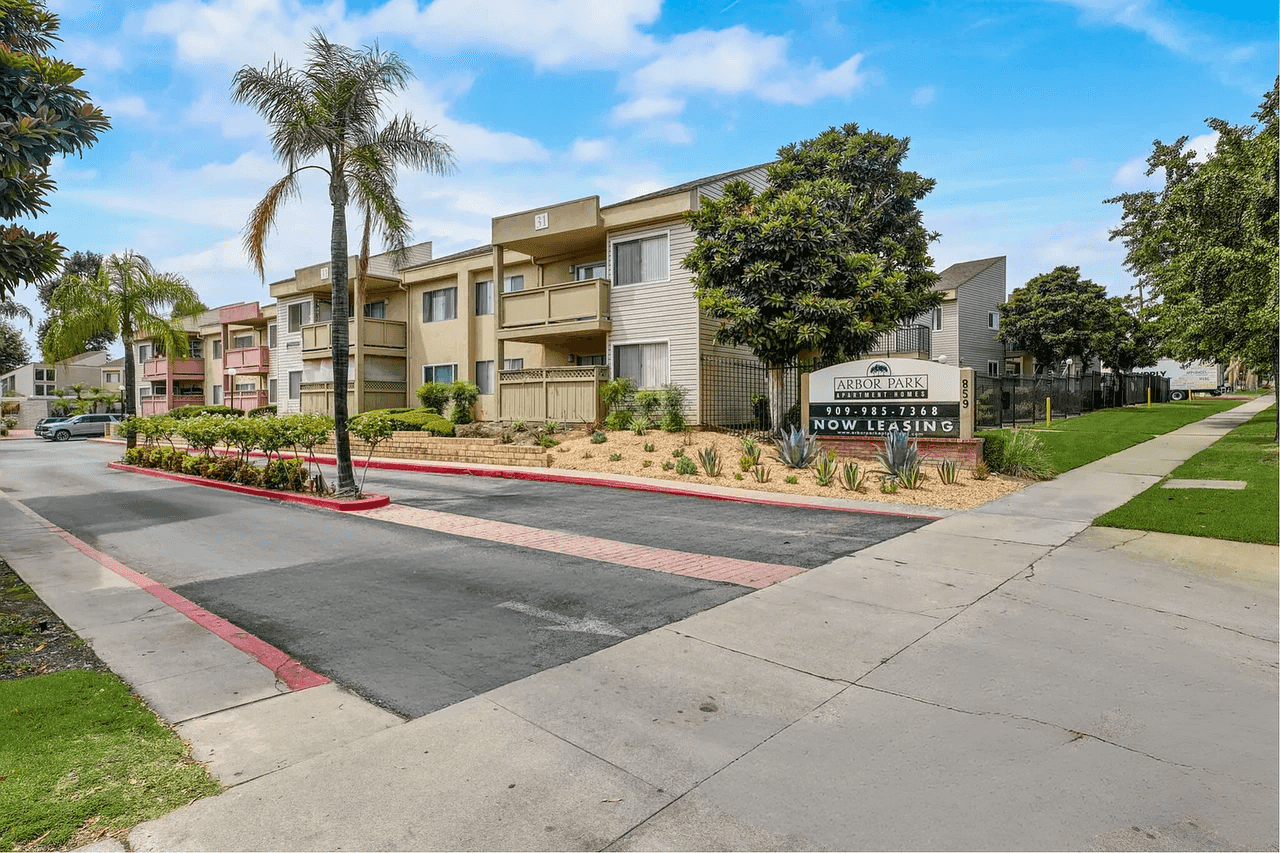 community entrance with leasing sign